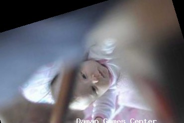 Rugby Rookies India Holi event showing players covered in colored powder after tackles, with a vibrant and festive stadium atmosphere