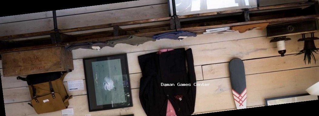 Rugby Rookies India gameplay showing a player making a tackle during a match in a rainy stadium, with water splashing effects